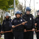 Police officers in riot gear walk toward protesters along Reisterstown Road near Mondawmin Mall in Baltimore April 27, 2015.
Drew Angerer/Getty Images